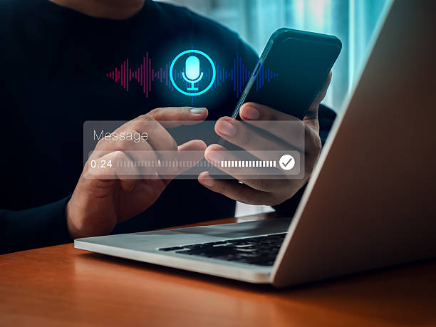 istock AI chatbot conversation and voice searching automation, voice recognition technology concept. Personal conversational assistant technology with digital sound wave audio graphic on smartphone in hand. 2207785181
