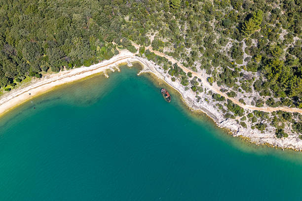 istock Landscape with sunken ship near the shore 2207785610