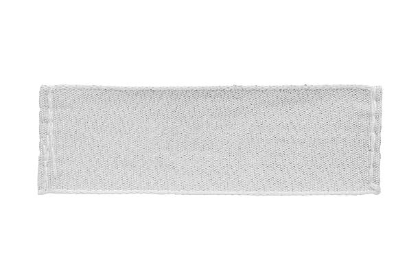 istock White blank clothing tag label isolated on white background 2207786106