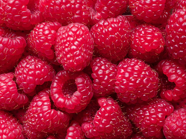 istock Top view raspberries close up. Raspberries as a background 2207786294