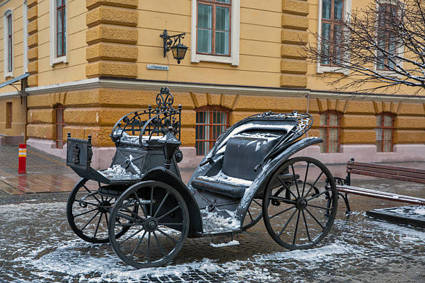 Chernivtsi, Ukraine - December 23, 2024: Iron wedding carriage on winter Kobylyanska Street. Chernivtsi is the capital of historic region of Bukovina, which is now divided between Romania and Ukraine.