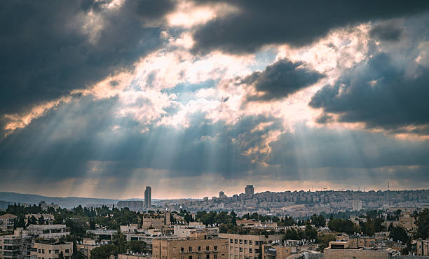 Majestic panorama of Jerusalem with breathtaking dramatic clouds stretching over the ancient city.