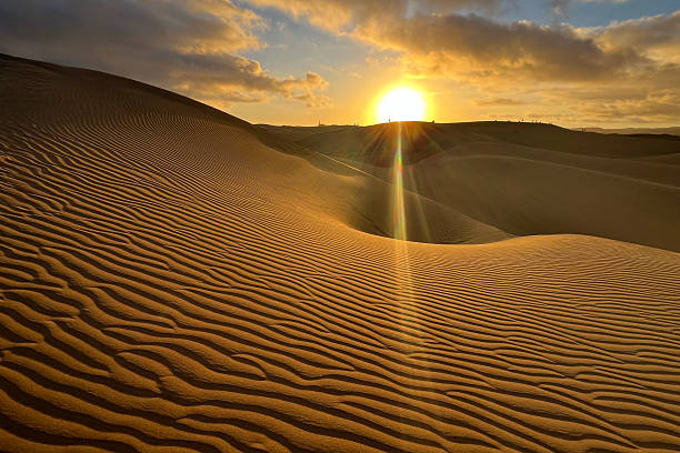 istock A colorful sunset at a Maspalomas dune, Gran Canaria island 2207795463