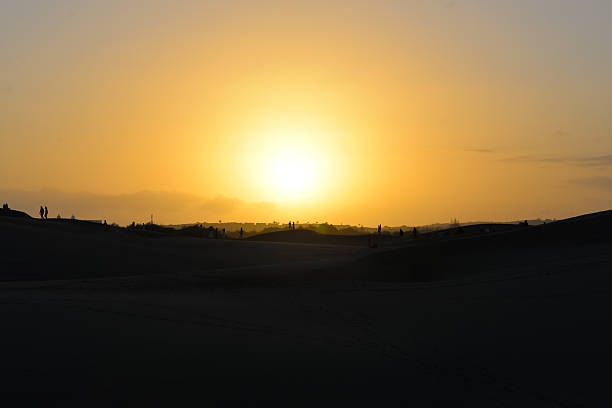 A colorful sunset at a Maspalomas dune, Gran Canaria island.