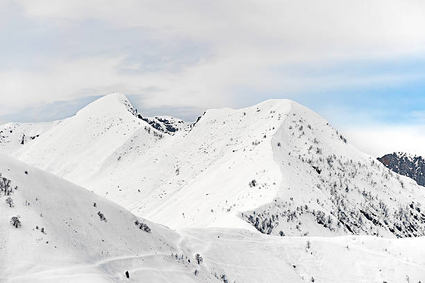 Range of winter mountain peaks at sunny day at Soelden Austria