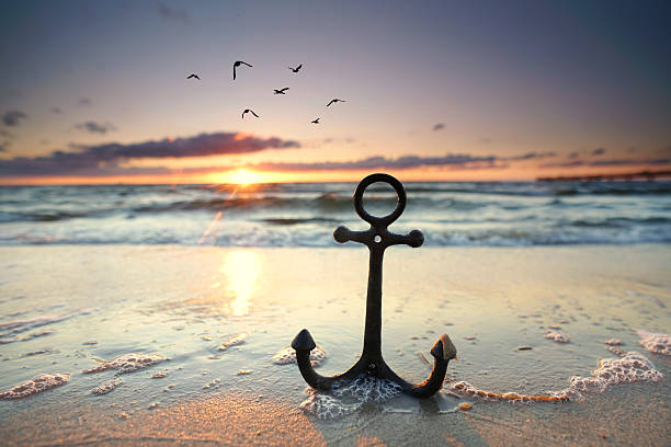 anchor at the beach with sunset light