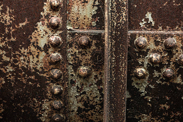 istock Rust background texture. Metal surface. Industrial rusted steel. Rusted metal. Aged metallic backdrop. Stained and oxidized metal sheet. Rust texture. Metal corrosion. Textured and damaged iron. 2207800831