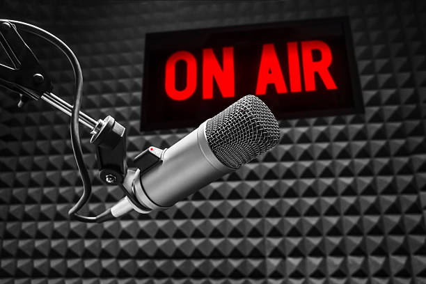 istock Professional microphone and on air sign 2207801141