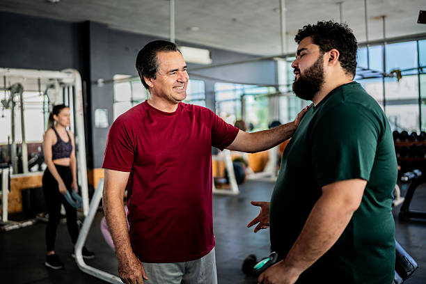 istock Friends talking at gym 2207806955