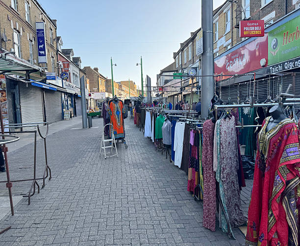 Setting up stalls in Walthamstow Market, in Walthamstow, east London. March 2025