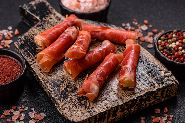istock Cheese and meat, jamon or prosciutto rolled into a roll 2207812263