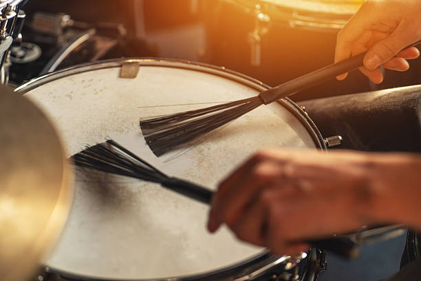 istock Hands playing snare drum with jazz brushes, detailed percussion close-up, soft rhythm, acoustic music technique, jazz session, artistic expression 2207815558