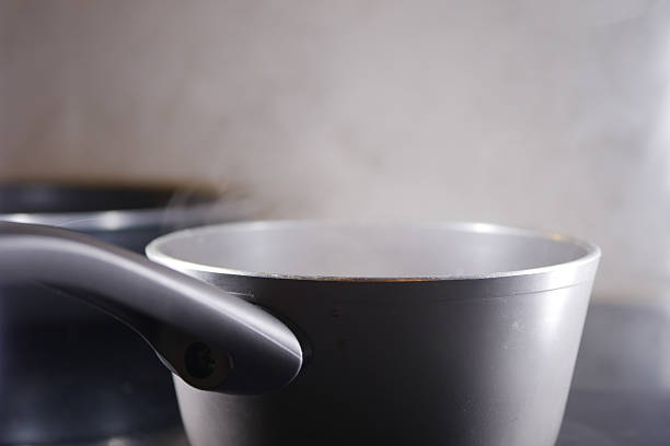 istock steam rising from saucepan closeup 2207817132