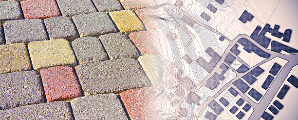 COLORED CONCRETE PERMEABLE FLOORING called self-locking floor assembled on a substrate of sand along the streets, sidewalks, an squares of the city - concept with imaginary city map.