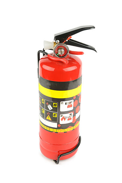 istock Household fire extinguisher isolated on white. 2207820763