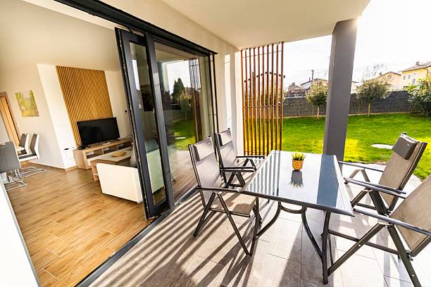 istock Stylish Covered Terrace with Direct Access to Living Area 2207821748