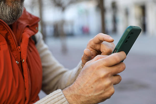 istock Man in his 50s using a smartphone. 2207824561