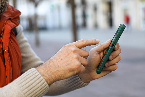 istock Man in his 50s using a smartphone. 2207824692
