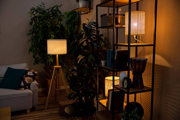 istock Creating a Cozy Living Room Ambience with Soft Warm Lighting and Lush Greenery Elements 2207825406