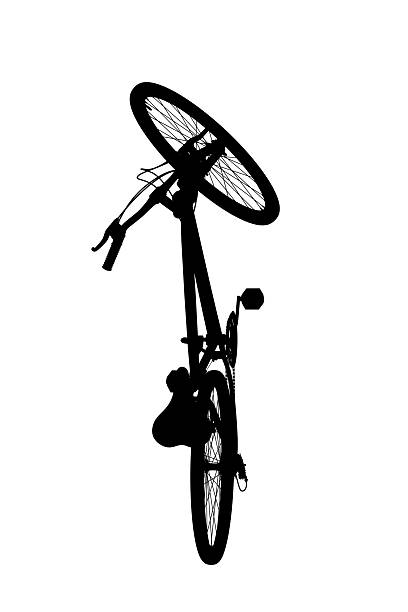 Shadow silhouette of cyclist riding bike and pedestrian walking city sidewalk, in black and white high contrast