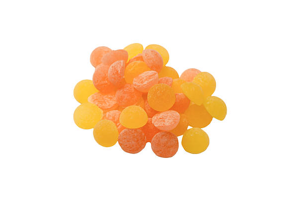 istock Bright citrus lollipops isolated on a white background. 2207826379