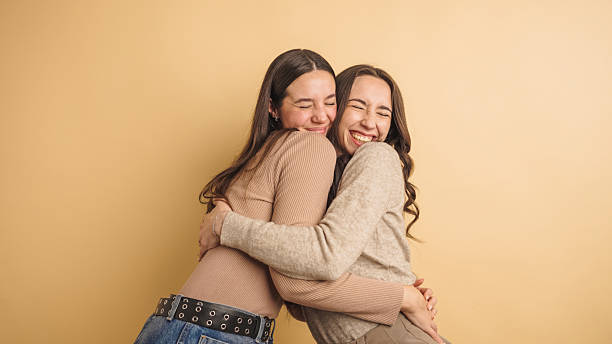 istock Joyful friends embracing in warm harmony 2207829621