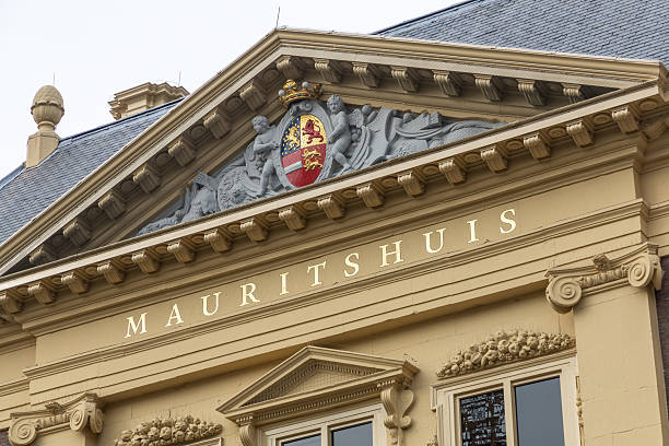 The Hague, the Netherlands. 15 February 2025. Mauritshuis gold letters on the facade of the museum.