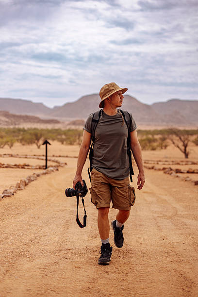 istock Solo Safari Photographer Exploring the Wild 2207833859