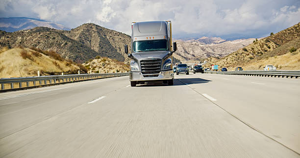 istock Silver Cargo Truck Driving on Interstate 5 in California 2207842859