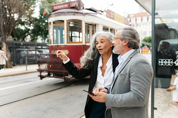 istock Senior couple discussing while waiting for public transport 2207843005