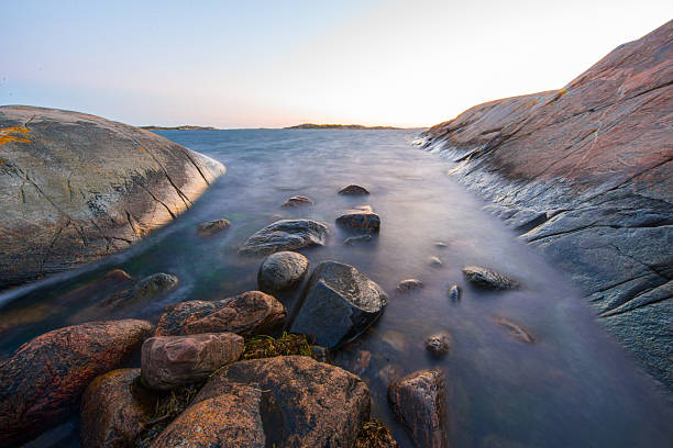 istock Serene ocean view with rocky coastline at dusk.. 2207846933