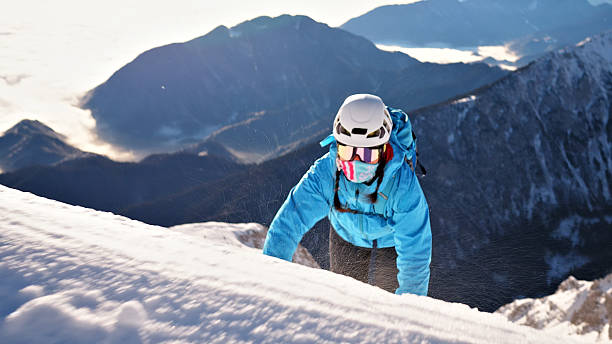 istock Snowy peak, mountain climber, teamwork, adventure 2207850299