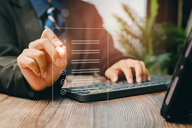 istock Businessman creating digital checklist on laptop, Business concept 2207854555