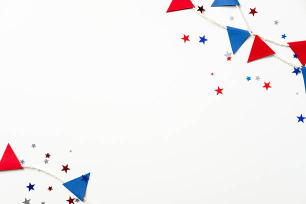 istock Patriotic festive decor with red and blue triangular flags, star-shaped confetti on a white background. Perfect for holidays, celebrations, or themed parties 2207855554