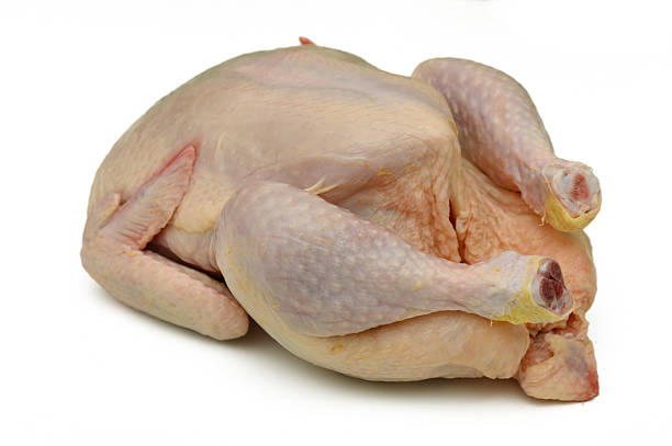 istock Raw chicken ready for cooking preparation in a kitchen setting during the early morning hours 2207859438