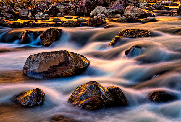 istock Zion Scenic, water flowing through boulders 2207864877