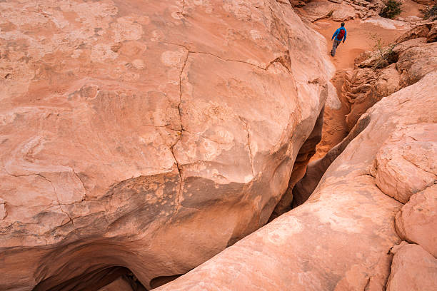 istock Tight Squeeze Hiking in Slot Canyon 2207871992