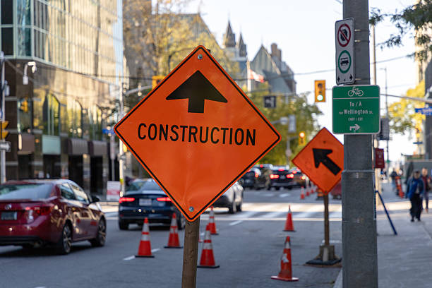 istock Construction sign on the road in downtown Ottawa, Canada. 2207873611