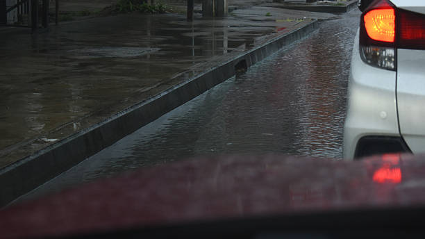 istock car on highway road with rainny season, blurred image 2207888495