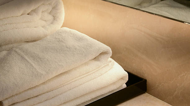 istock fold of white towel prepare for shower in bathroom 2207889143