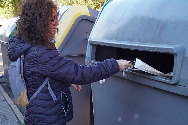 istock woman recycling cardboard 2207890764