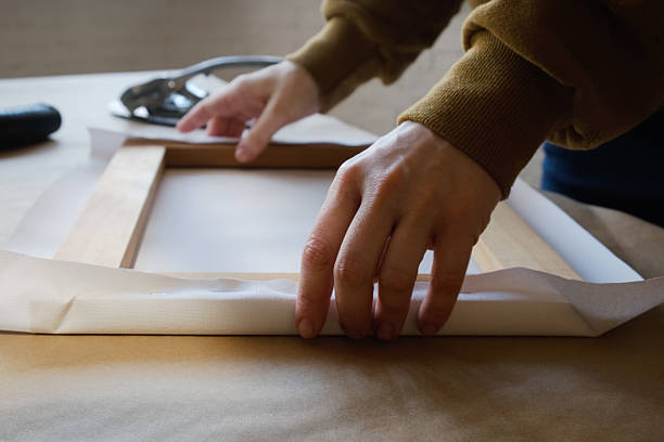 Stretching canvas on stretcher bars. Gallery wrap. Print on canvas.
