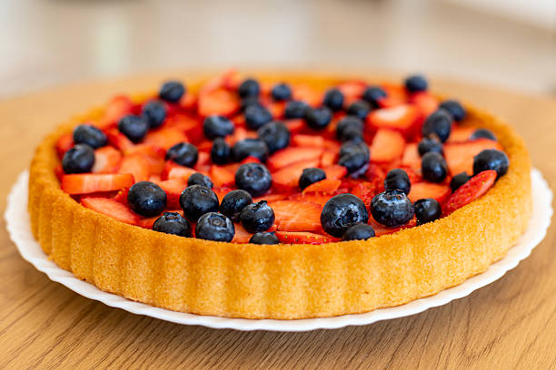 Strawberry pie top view. Beautiful fruit cake on the table. Homemade cakes. High quality photo