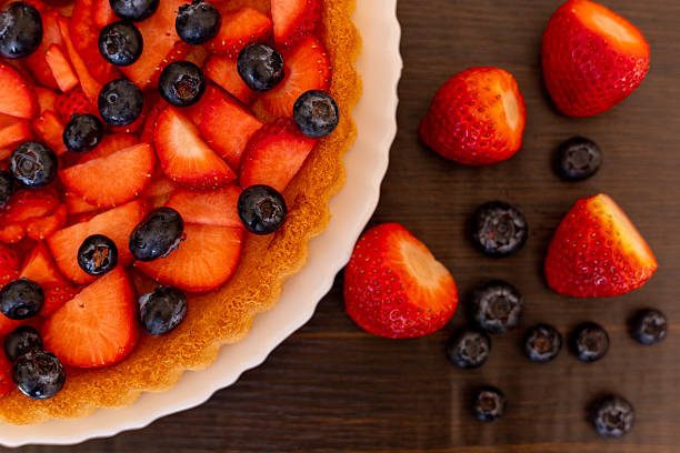 Strawberry pie top view. Beautiful fruit cake on the table. Homemade cakes. High quality photo