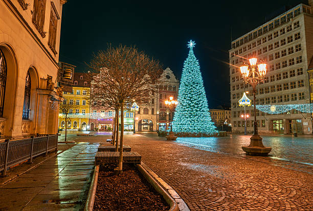 istock Christmas Tree and Fredro Monument Illuminated at Night in Wroclaw Market Square 2207894884