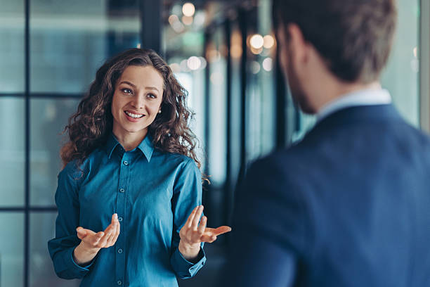 istock Smiling young businesswoman during a conversation 2207895133