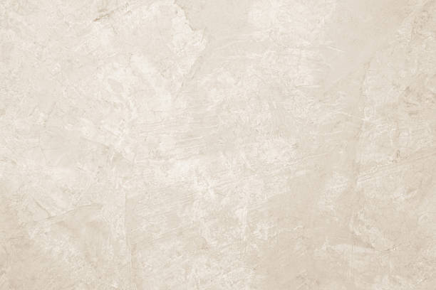 istock Colour old concrete wall texture background. Close up retro plain cream color cement wall background texture. Design paper vintage parchment element. 2207900643