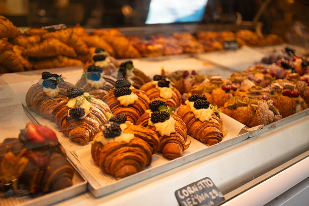 istock Display of fresh croissants and pastries in a bakery. 2207912557