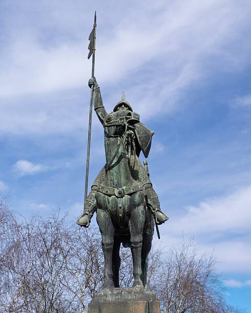 istock Statue of a knight on horseback with lance. 2207912811