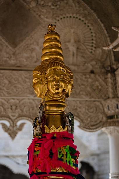 istock Golden statue with colorful adornments. 2207913342